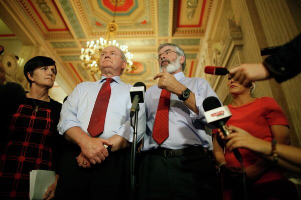 Sinn Fein party leader Gerry Adams, right, and Martin McGuinness speak to the media at Parliament Buildings, Stormont, Belfast, Northern Ireland, Thursday, Sept. 10, 2015. Sinn Fein party leader Gerry Adams, right, and Martin McGuinness speak to the media at Parliament Buildings, Stormont, Belfast, Northern Ireland, Thursday, Sept. 10, 2015. - Sputnik International