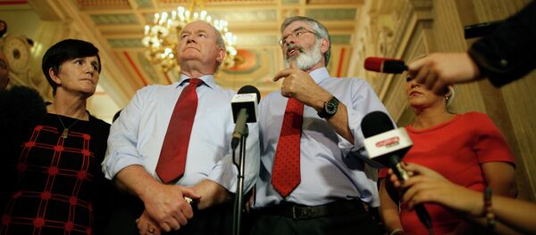 Sinn Fein party leader Gerry Adams, right, and Martin McGuinness speak to the media at Parliament Buildings, Stormont, Belfast, Northern Ireland, Thursday, Sept. 10, 2015. - Sputnik International