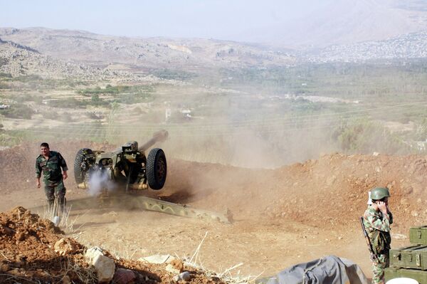 Syrian troops shoot at the Islamist forces' positions near Al-Zabadani in Syria Syrian troops shoot at the Islamist forces' positions near Al-Zabadani in Syria - Sputnik International