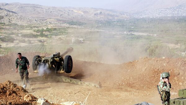 Syrian troops shoot at the Islamist forces' positions near Al-Zabadani in Syria - Sputnik International