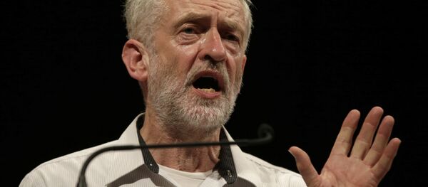 British lawmaker Jeremy Corbyn addressing a meeting during his election campaign for the leadership of the British Labour Party in Ealing, west London, Monday, Aug. 17, 2015. British lawmaker Jeremy Corbyn addressing a meeting during his election campaign for the leadership of the British Labour Party in Ealing, west London, Monday, Aug. 17, 2015. - Sputnik International