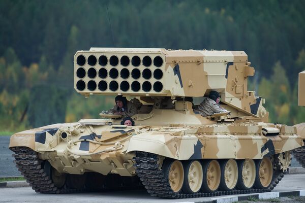 Heavy flamethrower system TOS-1 Buratino during demonstration firing conducted at the 10th Russia Arms Expo international exhibition's opening - Sputnik International