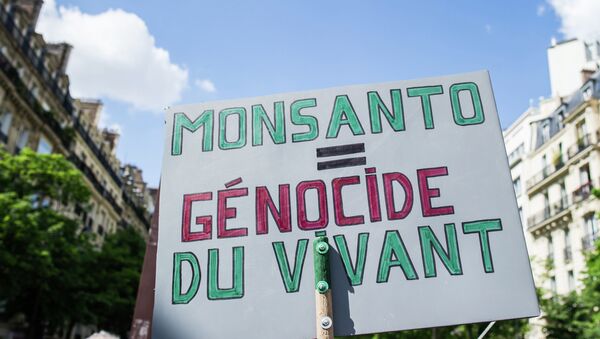 A banner is photographed, during a World March Against Monsanto, in Paris, France, in Paris, Saturday, May 23 2015 - Sputnik International