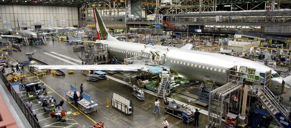 Workers build a Boeing Co. 737 at the company's Renton, Wash. assembly plant Tuesday, Jan. 31, 2006 Workers build a Boeing Co. 737 at the company's Renton, Wash. assembly plant Tuesday, Jan. 31, 2006 - Sputnik International