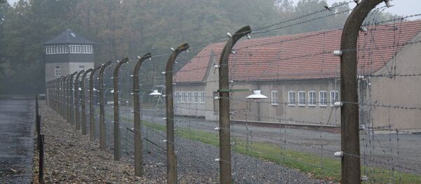 Part of the barbed wire surrounding the former Buchenwald camp Part of the barbed wire surrounding the former Buchenwald camp - Sputnik International