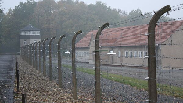 Part of the barbed wire surrounding the former Buchenwald camp - Sputnik International