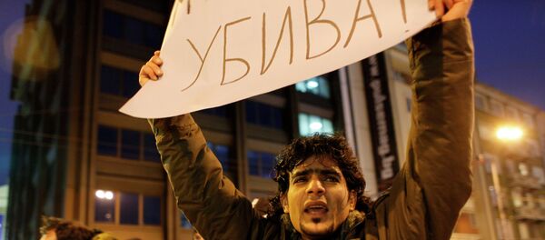 Protestor holds a poster reading Keeping silence might kill, as he shouts slogans during a flash mob demonstration by refugees and migrants that has closed the main street to traffic, in Sofia, Bulgaria, Friday, Feb. 25, 2011 Protestor holds a poster reading Keeping silence might kill, as he shouts slogans during a flash mob demonstration by refugees and migrants that has closed the main street to traffic, in Sofia, Bulgaria, Friday, Feb. 25, 2011 - Sputnik International