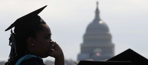 With the US Capitol as a backdrop, George Washington University students gather for their commencement ceremony on the National Mall in Washington With the US Capitol as a backdrop, George Washington University students gather for their commencement ceremony on the National Mall in Washington - Sputnik International
