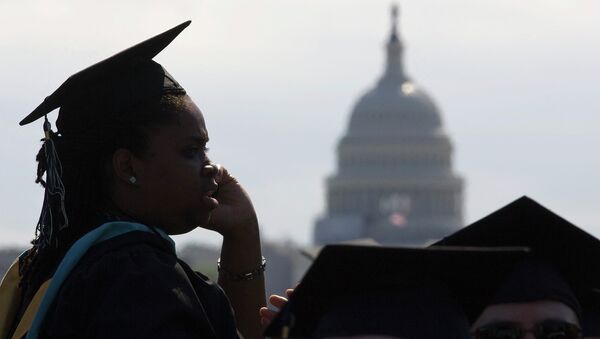 With the US Capitol as a backdrop, George Washington University students gather for their commencement ceremony on the National Mall in Washington - Sputnik International