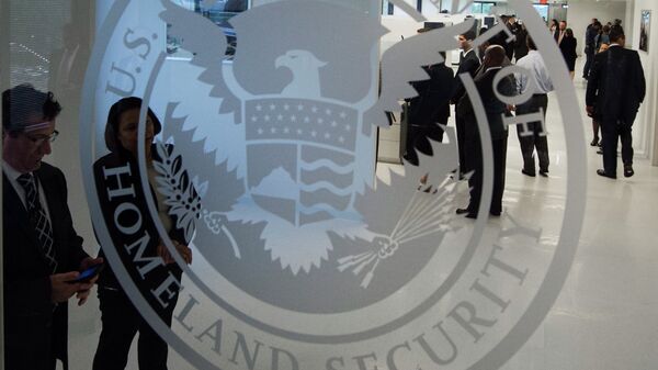 The Department of Homeland Security logo is seen at the new ICE Cyber Crimes Center expanded facilities in Fairfax, Virginia July 22, 2015. - Sputnik International