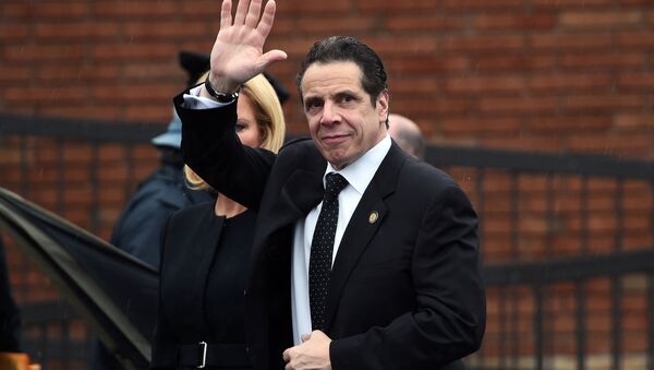 New York Governor Andrew Cuomo arrives at a funeral home to attend a wake for New York Police Department (NYPD) officer Wenjian Liu in New York's borough of Brooklyn on January 3, 2015 - Sputnik International