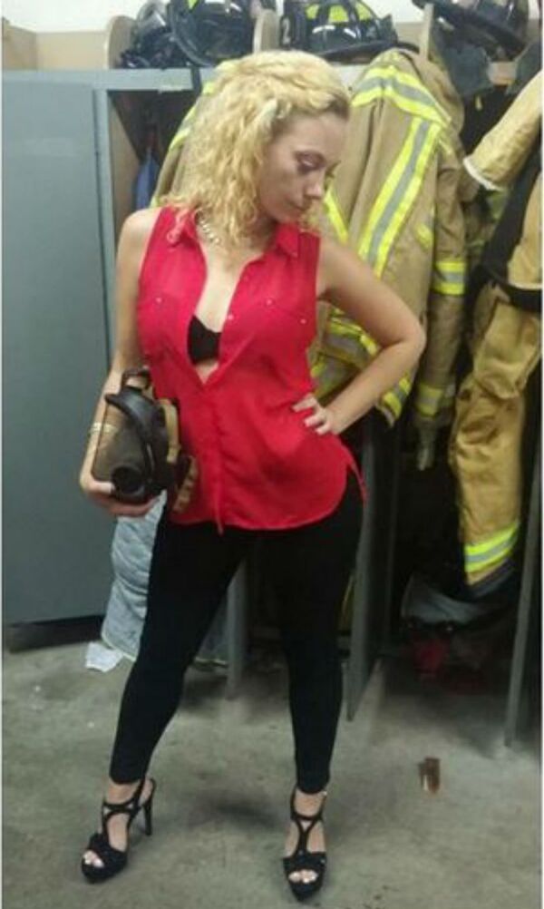 This photo of a woman posing in an Atlanta fire station appeared in an ad for adult escort services. - Sputnik International