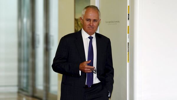 Federal Communications Minister Malcolm Turnbull walks out of a government party room meeting in Canberra's Parliament House in this file picture taken February 9, 2015. - Sputnik International