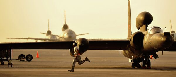 A member of the 380th Expeditionary Aircraft Maintenance Squadron assists in the removal of the temporary landing gear on a U-2. A member of the 380th Expeditionary Aircraft Maintenance Squadron assists in the removal of the temporary landing gear on a U-2. - Sputnik International