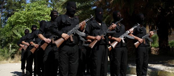 Rebel fighters who recently joined the Failaq al-Rahman brigade take part in a training session with fake weapons at a camp in Syria's rebel-held Eastern Ghouta region before being sent to the front lines Rebel fighters who recently joined the Failaq al-Rahman brigade take part in a training session with fake weapons at a camp in Syria's rebel-held Eastern Ghouta region before being sent to the front lines - Sputnik International