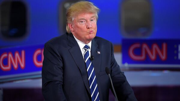 Republican presidential candidate, businessman Donald Trump reacts during the CNN Republican presidential debate. - Sputnik International
