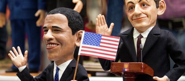 Puppets of US President Barack Obama and former French President Nicolas Sarkozy are seen on display at the international puppet exhibition in Moscow, Russia, Thursday, Oct. 6, 2011. Puppets of US President Barack Obama and former French President Nicolas Sarkozy are seen on display at the international puppet exhibition in Moscow, Russia, Thursday, Oct. 6, 2011. - Sputnik International