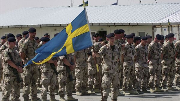 Swedish soldiers part of the International Security Assistant Force (ISAF) stand during a changing of command ceremony at the Swedish run Provincial Reconstruction Team in Mazar Sharif north of Kabul, Afghanistan on Tuesday May 6, 2008 - Sputnik International