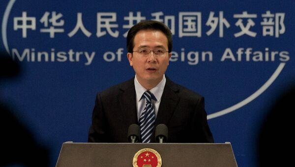 Chinese Foreign Ministry spokesman Hong Lei speaks during a news briefing at the Ministry of Foreign Affairs in Beijing, China, Thursday, Dec. 8, 2011 - Sputnik International