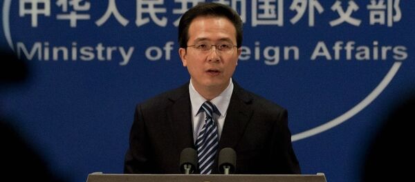 Chinese Foreign Ministry spokesman Hong Lei speaks during a news briefing at the Ministry of Foreign Affairs in Beijing, China, Thursday, Dec. 8, 2011 Chinese Foreign Ministry spokesman Hong Lei speaks during a news briefing at the Ministry of Foreign Affairs in Beijing, China, Thursday, Dec. 8, 2011 - Sputnik International