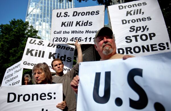 File photo of demonstrators protesting against the use of drones outside the International Conference on Unmanned Aircraft Systems at the Grand Hyatt Hotel, Tuesday, May 28, 2013, in Atlanta File photo of demonstrators protesting against the use of drones outside the International Conference on Unmanned Aircraft Systems at the Grand Hyatt Hotel, Tuesday, May 28, 2013, in Atlanta - Sputnik International