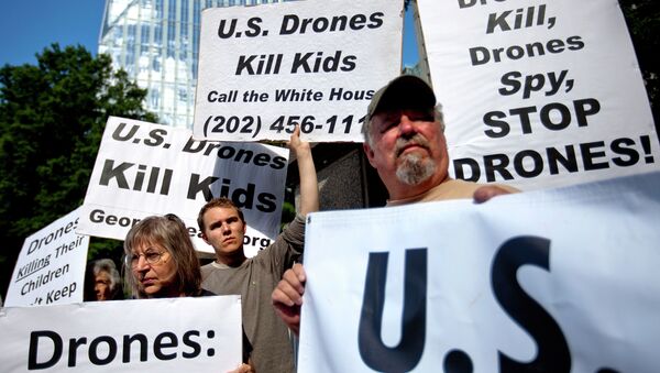 File photo of demonstrators protest against the use of drones outside the International Conference on Unmanned Aircraft Systems at the Grand Hyatt Hotel, Tuesday, May 28, 2013, in Atlanta - Sputnik International
