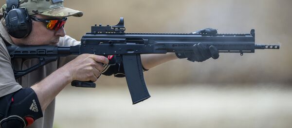 Demo firing a Saiga 12 smoothbore autoloading shotgun Demo firing a Saiga 12 smoothbore autoloading shotgun - Sputnik International