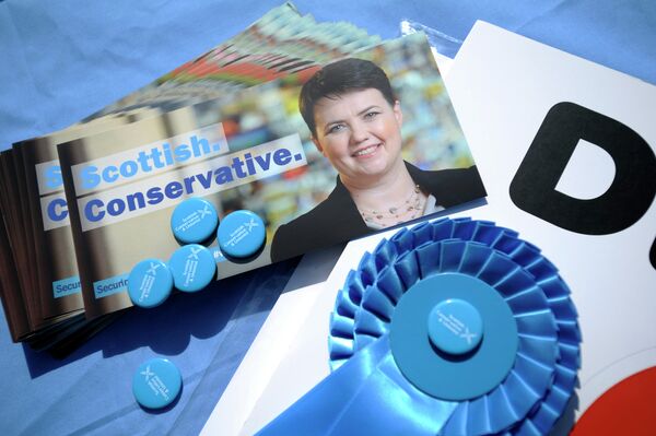 Canvassing materials showing the face of Ruth Davidson, leader of the Scottish Conservatives, are pictured as she campaigns for the UK general election in the centre of Edinburgh on April 23, 2015 Canvassing materials showing the face of Ruth Davidson, leader of the Scottish Conservatives, are pictured as she campaigns for the UK general election in the centre of Edinburgh on April 23, 2015 - Sputnik International