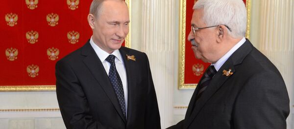 May 9, 2015. Russian President Vladimir Putin (left) welcomes President of Palestine Mahmoud Abbas during his meeting with foreign delegation heads and honorary guests in the Kremlin May 9, 2015. Russian President Vladimir Putin (left) welcomes President of Palestine Mahmoud Abbas during his meeting with foreign delegation heads and honorary guests in the Kremlin - Sputnik International