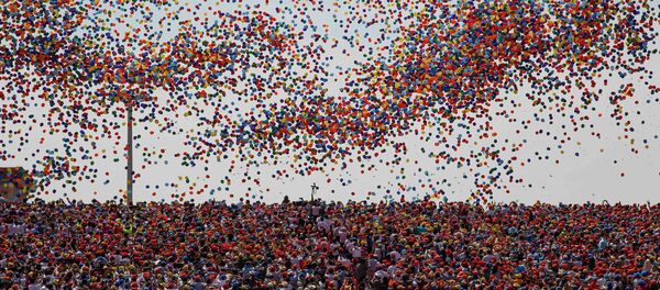 File Photo: Balloons are released as a crowd looks up during a military parade over Tiananmen Square in Beijing on September 3, 2015, to mark the 70th anniversary of victory over Japan and the end of World War II - Sputnik International