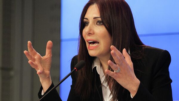 Member of the opposition delegation Randa Kassis speaks at a press conference in Moscow on April 9, 2015 after talks between the Syrian government and members of the domestic opposition - Sputnik International