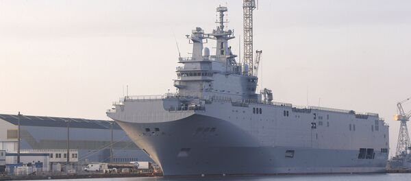 In this Friday, Sept. 5, 2014 file photo, the Vladivostok warship, the first of two Mistral-class helicopter carriers ordered by Russia, docks on the port of Saint-Nazaire, western France. In this Friday, Sept. 5, 2014 file photo, the Vladivostok warship, the first of two Mistral-class helicopter carriers ordered by Russia, docks on the port of Saint-Nazaire, western France. - Sputnik International