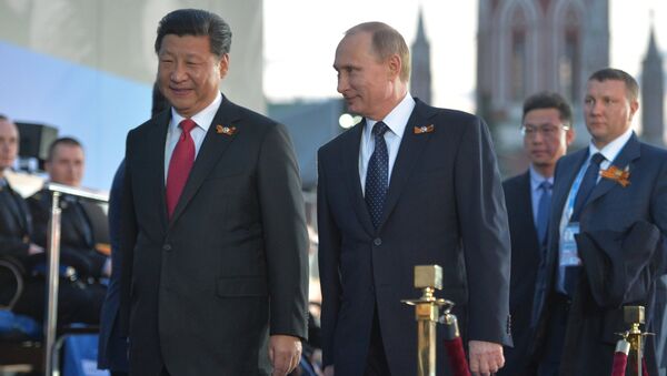 Russian President Vladimir Putin and President of the People's Republic of China Xi Jinping - Sputnik International