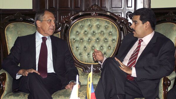 Russian Foreign Minister Sergei Lavrov (left) and Venezuelan President Nicolas Maduro - Sputnik International