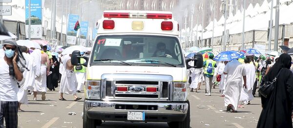 An ambulance evacuates victims following a crush caused by large numbers of people pushing at Mina, outside the Muslim holy city of Mecca September 24, 2015. An ambulance evacuates victims following a crush caused by large numbers of people pushing at Mina, outside the Muslim holy city of Mecca September 24, 2015. - Sputnik International
