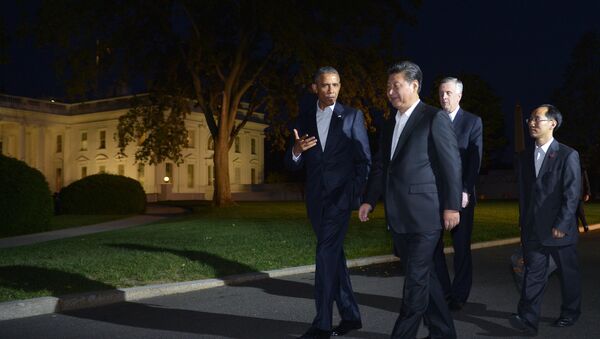 US President Barack Obama and China's President Xi Jinping walk from the White House to a working dinner at Blair House, on September 24, 2015 in Washington, DC. - Sputnik International