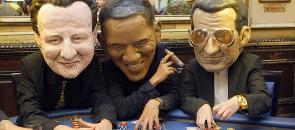 Oxfam international activists pose as British Prime Minister, David Cameron, left, United State President Barak Obama, and French President Nicolas Sarkozy, right. Oxfam international activists pose as British Prime Minister, David Cameron, left, United State President Barak Obama, and French President Nicolas Sarkozy, right. - Sputnik International