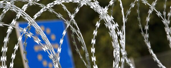 A razor wire fence installed by Hungarian soldiers is seen at the border between Hungary and Slovenia near Tornyiszentmiklos, 245 kms southwest of Budapest, Hungary, Thursday, Sept. 24, 2015 A razor wire fence installed by Hungarian soldiers is seen at the border between Hungary and Slovenia near Tornyiszentmiklos, 245 kms southwest of Budapest, Hungary, Thursday, Sept. 24, 2015 - Sputnik International