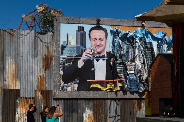 A poster of British PM David Cameron at Dismaland. - Sputnik International