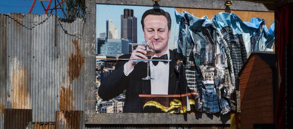 A poster of British PM David Cameron at Dismaland. - Sputnik International