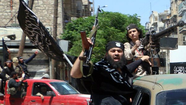 Fighters from Al-Qaeda's Syrian affiliate Al-Nusra Front drive in the northern Syrian city of Aleppo. - Sputnik International
