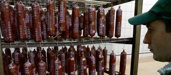 An employee at work at the Kolyada sausage factory in the Kaliningrad region An employee at work at the Kolyada sausage factory in the Kaliningrad region - Sputnik International