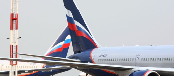 An Aeroflot Boeing 767, right, at the Sheremetyevo International Airport in Moscow An Aeroflot Boeing 767, right, at the Sheremetyevo International Airport in Moscow - Sputnik International