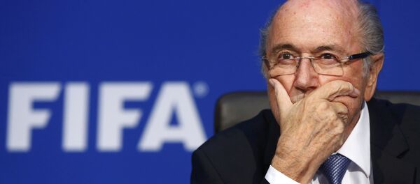FIFA President Sepp Blatter reacts during a news conference after the Extraordinary FIFA Executive Committee Meeting at the FIFA headquarters in Zurich, Switzerland, in this July 20, 2015 file photo - Sputnik International