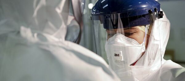 Checking Personal Protective Equipment (PPE) in the fight against Ebola - Sputnik International