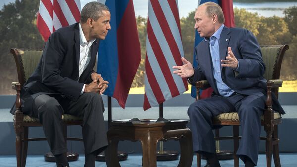 June 17, 2013. Russian President Vladimir Putin, right, and US President Barack Obama during a meeting at the G8 summit in Northern Ireland - Sputnik International