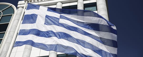 FILE - In this Feb. 3, 2015, file photo, a Greek flag flies outside the Athens Stock Exchange - Sputnik International