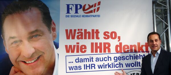Head of Austrian Freedom Party (FPOe) Heinz-Christian Strache presents an election campaign poster in Vienna, Austria, September 24, 2015. Regional elections take place in Vienna on October 11, 2015 Head of Austrian Freedom Party (FPOe) Heinz-Christian Strache presents an election campaign poster in Vienna, Austria, September 24, 2015. Regional elections take place in Vienna on October 11, 2015 - Sputnik International