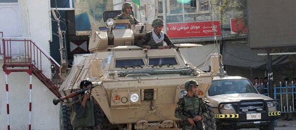 Afghan soldiers keep watch during a battle with the Taliban in Kunduz Province, Afghanistan September 28, 2015 Afghan soldiers keep watch during a battle with the Taliban in Kunduz Province, Afghanistan September 28, 2015 - Sputnik International