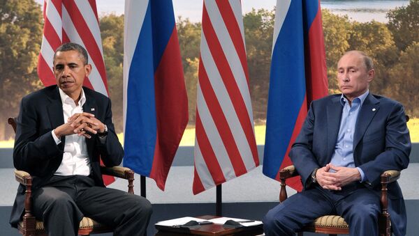 Russian President Vladimir Putin, right, and U.S. President Barack Obama have a meeting within the framework of the G8 summit in Northern Ireland, 17 June 2013 - Sputnik International